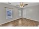 Bright bedroom with wood floors and ample closet space at 5620 Bridgetowne Way, Raleigh, NC 27609