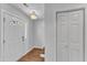 Bright and airy entryway with hardwood floors and coat closet at 5620 Bridgetowne Way, Raleigh, NC 27609