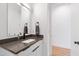 Modern bathroom with a sleek vanity and updated fixtures at 1511 Malta Ave, Raleigh, NC 27610