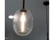 Close-up of a modern kitchen light fixture with a clear glass shade at 1511 Malta Ave, Raleigh, NC 27610