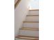 Modern staircase with white risers and light oak treads at 1511 Malta Ave, Raleigh, NC 27610