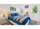 Well-lit bedroom featuring a plush bed and tasteful decor at 1511 Malta Ave, Raleigh, NC 27610
