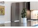 Modern kitchen island with dark countertop and built-in appliances at 1511 Malta Ave, Raleigh, NC 27610