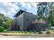 Contemporary gray house with multiple balconies and a spacious yard at 1511 Malta Ave, Raleigh, NC 27610