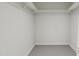 Spacious walk-in closet with ample shelving at 4046 Elk Creek Ln # 62, Raleigh, NC 27612