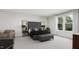 Elegant bedroom with a king-size bed and sitting area at 4046 Elk Creek Ln # 62, Raleigh, NC 27612