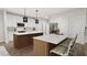 Modern kitchen with island and stainless steel appliances at 4046 Elk Creek Ln # 62, Raleigh, NC 27612