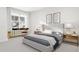 Bright bedroom with a comfortable bed and workspace at 4046 Elk Creek Ln # 62, Raleigh, NC 27612