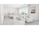 Spacious bedroom with plush bed, two armchairs, and large windows at 4046 Elk Creek Ln # 62, Raleigh, NC 27612