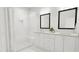 Spa-like bathroom with double vanity, large shower, and marble tile at 4046 Elk Creek Ln # 62, Raleigh, NC 27612