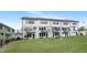 Modern townhome community with spacious backyard and lush lawn at 4047 Elk Creek Ln # 13, Raleigh, NC 27612