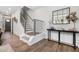 Modern staircase with metal railing and light-colored wood at 4047 Elk Creek Ln # 13, Raleigh, NC 27612