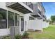 Private patio with exterior access and ample green space at 4047 Elk Creek Ln # 13, Raleigh, NC 27612