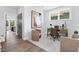 Bright home office with a desk, chair, and large artwork at 4047 Elk Creek Ln # 13, Raleigh, NC 27612