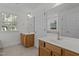 Double vanity bathroom with updated fixtures and large mirror at 2 Piney Ridge Ct, Durham, NC 27712