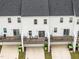 Aerial view of townhouses with private decks and parking at 104 Vallco Ln, Durham, NC 27713