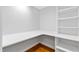 Bright office with built-in shelving and corner desk at 621 Sugarberry Rd, Chapel Hill, NC 27514