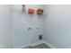 Laundry room with wire shelving, washer/dryer hookups, and pet door at 3181 Mission Olive Pl # 346, New Hill, NC 27562