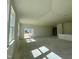 Bright and airy living area with sliding doors to the patio at 77 Frasier Fir Way, Lillington, NC 27546