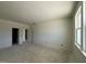 Unfinished bedroom with neutral walls and double window at 77 Frasier Fir Way, Lillington, NC 27546