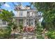 Two story home with wrap around porch and manicured landscaping at 1000 Lamond Ave, Durham, NC 27701