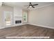 Living room with fireplace and hardwood floors at 775 Vick Rd, Spring Hope, NC 27882