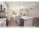 Open concept kitchen with large island and stainless steel appliances at 775 Vick Rd, Spring Hope, NC 27882
