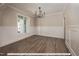 Bright dining room with hardwood floors and wainscoting at 775 Vick Rd, Spring Hope, NC 27882