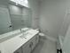 Bathroom with single vanity and bathtub at 230 Grading Stick Ct, Angier, NC 27501