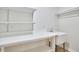 Laundry room with utility sink and shelving at 2805 Prather Place Pl, Wake Forest, NC 27587