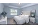 Spacious bedroom with light grey walls and a neutral color scheme at 9200 Leaning Post Rd # 451, Wake Forest, NC 27587