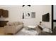 Bright living room features a comfy sofa, coffee table, and large TV at 512 Gordon St # 302, Durham, NC 27701