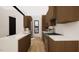 Open concept kitchen with breakfast bar and modern finishes at 512 Gordon St # 302, Durham, NC 27701