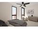 Second bedroom with ample natural light and built-in dresser at 512 Gordon St # 302, Durham, NC 27701
