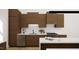 Modern kitchen with dark wood cabinets and quartz countertops at 512 Gordon St # 302, Durham, NC 27701