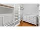 Spacious closet with built in shelving and dresser at 3700 Lark Farm Rd, Franklinton, NC 27525