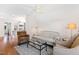 Comfortable sitting area features a sofa, armchairs, and a coffee table at 3700 Lark Farm Rd, Franklinton, NC 27525