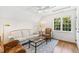 Relaxing sitting area with a sofa, armchairs, and a coffee table at 3700 Lark Farm Rd, Franklinton, NC 27525