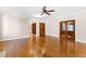 Home office with hardwood floors and built-in shelving at 3700 Lark Farm Rd, Franklinton, NC 27525