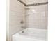 Updated bathroom with tile shower/tub combo and stylish fixtures at 3700 Lark Farm Rd, Franklinton, NC 27525