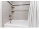 Bathroom with tile shower/tub combo and white shower curtain at 3700 Lark Farm Rd, Franklinton, NC 27525