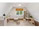 Playroom with hardwood floors and built-in shelving at 3700 Lark Farm Rd, Franklinton, NC 27525