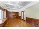 Spacious library featuring built-in bookshelves and hardwood floors at 3700 Lark Farm Rd, Franklinton, NC 27525