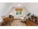 Home office with hardwood floors and built-in shelving at 3700 Lark Farm Rd, Franklinton, NC 27525