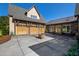 Three-car garage with large concrete driveway at 3700 Lark Farm Rd, Franklinton, NC 27525