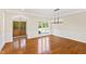 Bright dining room with hardwood floors and chandelier at 3700 Lark Farm Rd, Franklinton, NC 27525