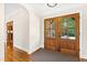 Bright and spacious entryway with hardwood floors and access to the kitchen at 3700 Lark Farm Rd, Franklinton, NC 27525