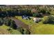 Aerial of house, pond, and farm at 3700 Lark Farm Rd, Franklinton, NC 27525