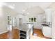 Modern kitchen featuring white cabinets, granite countertops and stainless steel appliances at 3700 Lark Farm Rd, Franklinton, NC 27525
