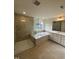 Main bathroom with a large walk-in shower and garden tub at 23 Quail Pt Cir, Clayton, NC 27520